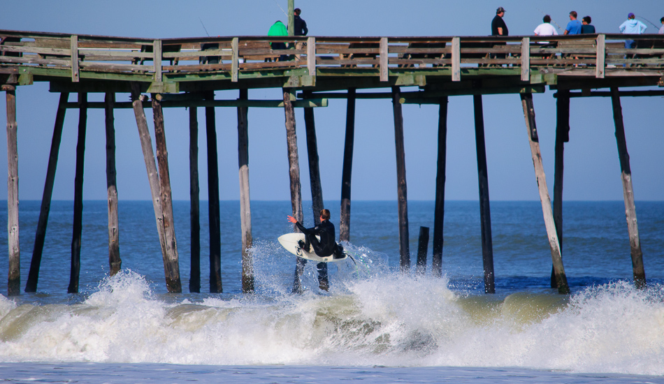 Following Sandy, the road South of Oregon Inlet was shut down for over a month and Nags Head Fishing Pier was only one place \"in town\" breaking. Emerald Isle to Nags Head transplant, Erik Schub takes full advantage of the ramp at the end of the right.